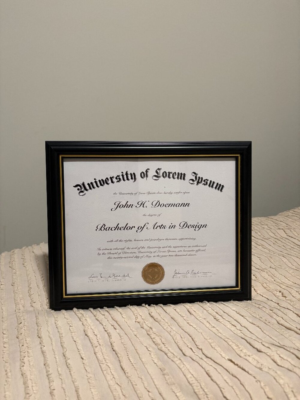 Black and gold diploma frame